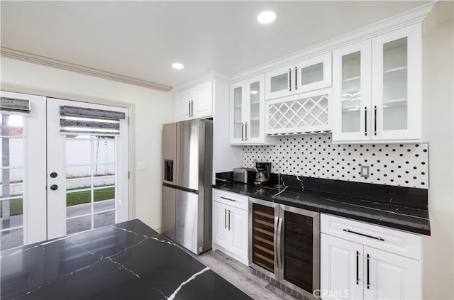 12246 Nadine Cir, Garden Grove, CA 92840 - kitchen featuring glass insert cabinets, stainless steel refrigerator with ice dispenser, tasteful backsplash, white cabinets, and wine cooler