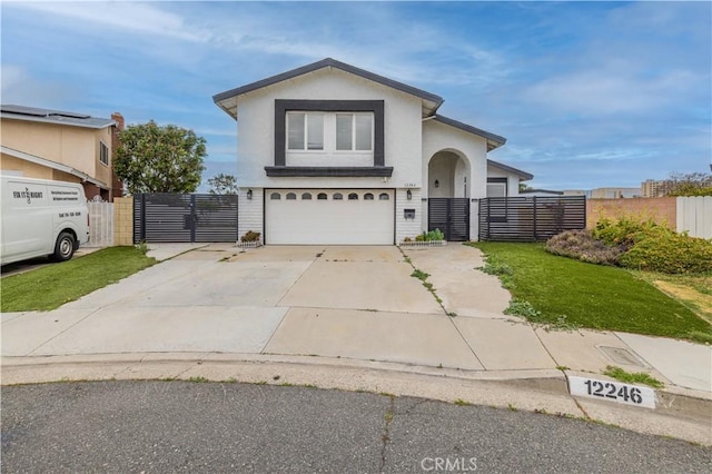 12246 Nadine Cir, Garden Grove, CA 92840 - traditional-style house featuring an attached garage, a gate, fence, and concrete driveway