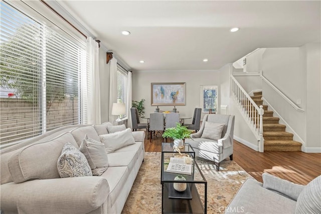 23664 Clearidge Dr, Valencia, CA 91354 - living room with stairs, wood finished floors, recessed lighting, and baseboards