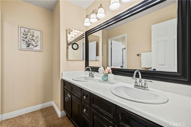 23664 Clearidge Dr, Valencia, CA 91354 - bathroom with double vanity and baseboards