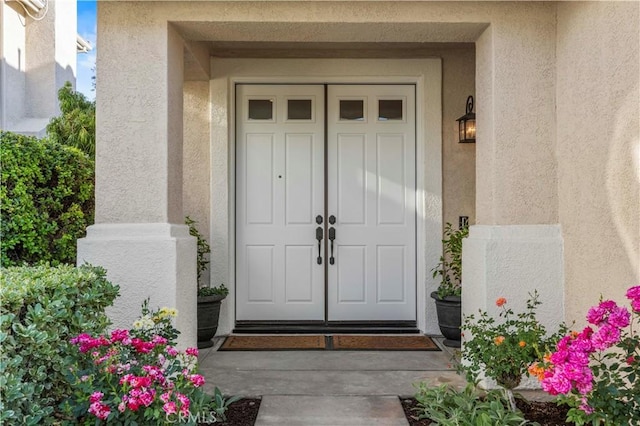 23664 Clearidge Dr, Valencia, CA 91354 - doorway to property with stucco siding