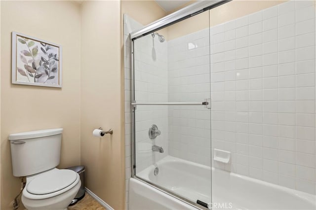 23664 Clearidge Dr, Valencia, CA 91354 - full bathroom featuring toilet, combined bath / shower with glass door, and baseboards