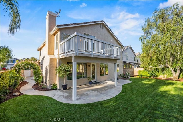 23664 Clearidge Dr, Valencia, CA 91354 - rear view of property featuring stucco siding, a patio area, and a chimney