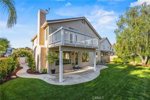 23664 Clearidge Dr, Valencia, CA 91354 - back of property featuring stucco siding, a patio, and a chimney