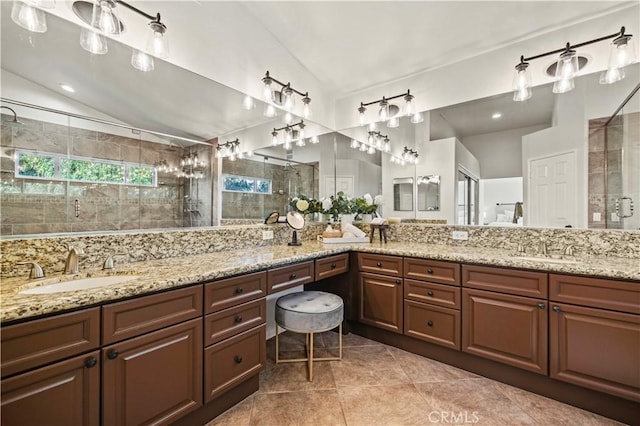 23664 Clearidge Dr, Valencia, CA 91354 - full bathroom featuring lofted ceiling, a tile shower, tile patterned floors, and double vanity
