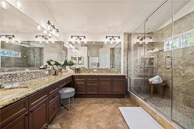 23664 Clearidge Dr, Valencia, CA 91354 - bathroom featuring a shower stall, vanity, and tile patterned flooring