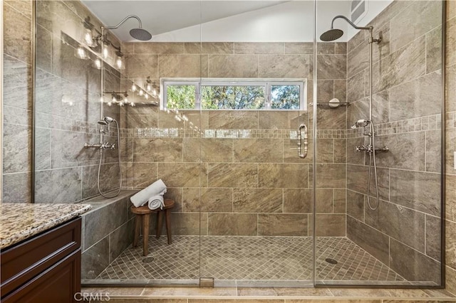 23664 Clearidge Dr, Valencia, CA 91354 - full bathroom featuring lofted ceiling, a stall shower, and vanity