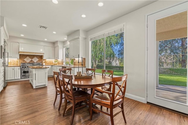 23664 Clearidge Dr, Valencia, CA 91354 - dining space featuring dark wood-type flooring and recessed lighting