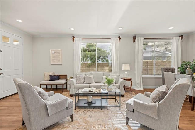 23664 Clearidge Dr, Valencia, CA 91354 - living area with ornamental molding, healthy amount of natural light, recessed lighting, and light wood-style floors