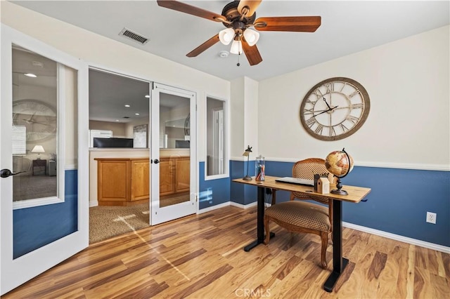 23664 Clearidge Dr, Valencia, CA 91354 - office featuring french doors, wood finished floors, a ceiling fan, and baseboards