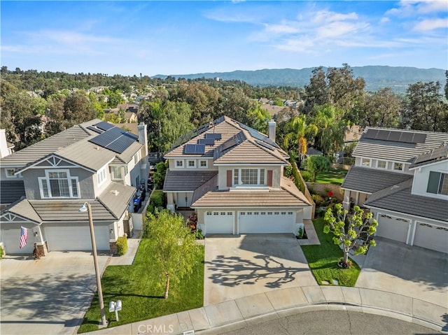 23664 Clearidge Dr, Valencia, CA 91354 - aerial perspective of suburban area featuring a mountainous background