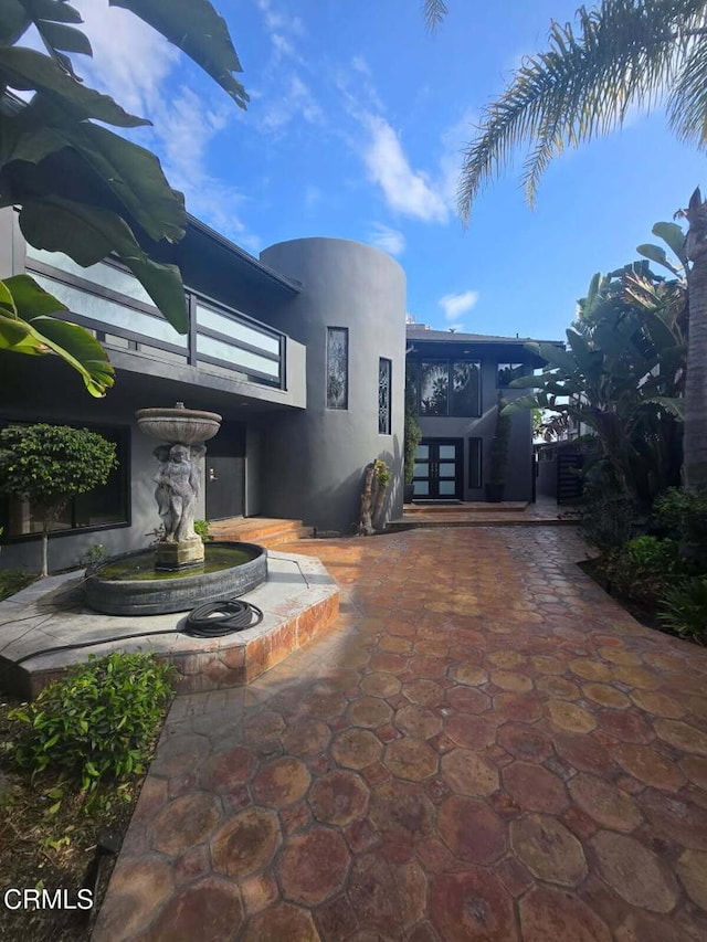 952 Peninsula St, Ventura, CA 93001 - view of property exterior with stucco siding and french doors
