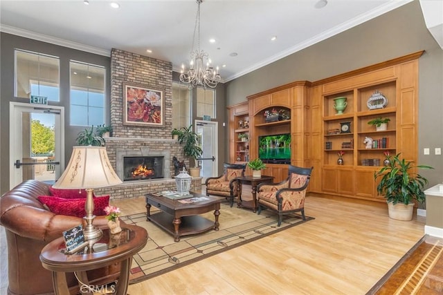 39312 Beringer Dr, Murrieta, CA 92563 - living area featuring light wood-type flooring, crown molding, a chandelier, a brick fireplace, and recessed lighting