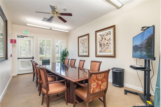 39312 Beringer Dr, Murrieta, CA 92563 - dining room with light colored carpet, a ceiling fan, and baseboards
