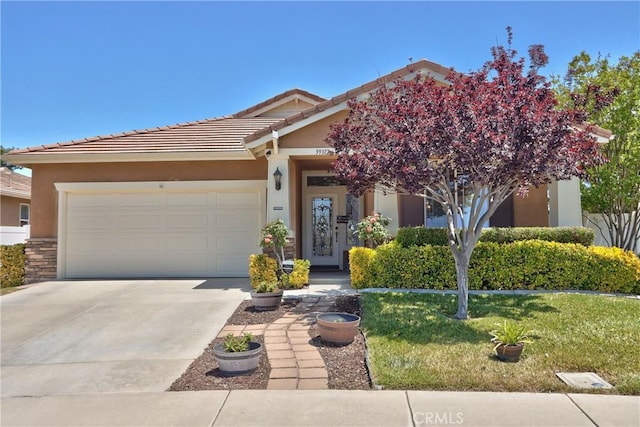 39312 Beringer Dr, Murrieta, CA 92563 - view of front facade with stucco siding, concrete driveway, a garage, a front yard, and a tiled roof
