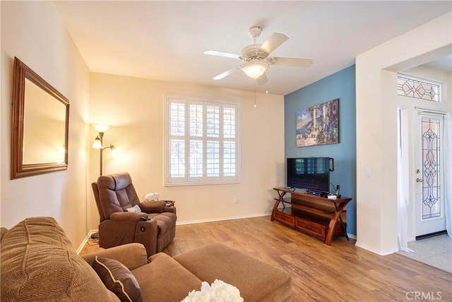 39312 Beringer Dr, Murrieta, CA 92563 - living area with a ceiling fan, baseboards, and wood finished floors