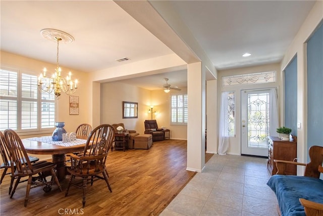 39312 Beringer Dr, Murrieta, CA 92563 - dining area with a chandelier, wood finished floors, baseboards, and recessed lighting