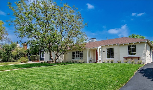 438 S Lamer St, Burbank, CA 91506 - ranch-style house featuring a front lawn and a chimney