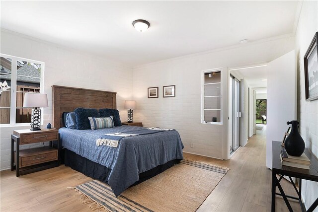438 S Lamer St, Burbank, CA 91506 - bedroom with light wood-style flooring and ornamental molding