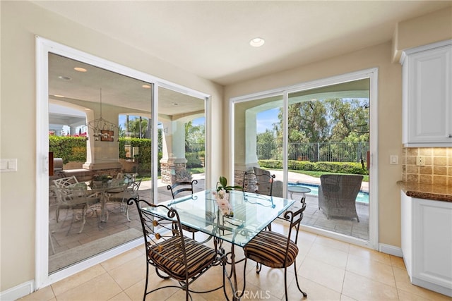 7 Rue Delacroix, Coto De Caza, CA 92679 - dining area featuring baseboards, light tile patterned flooring, and recessed lighting