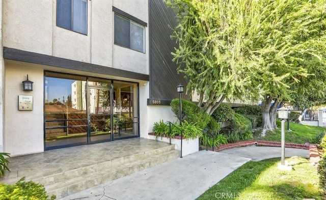 5805 Whitsett Ave Unit 102, Valley Village, CA 91607 - property entrance featuring stucco siding