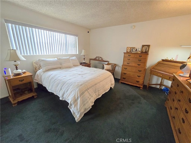 5805 Whitsett Ave Unit 102, Valley Village, CA 91607 - bedroom featuring dark colored carpet and a textured ceiling