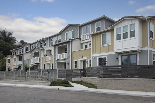 view of property featuring a fenced front yard
