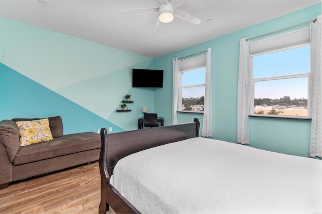 bedroom featuring ceiling fan and wood finished floors