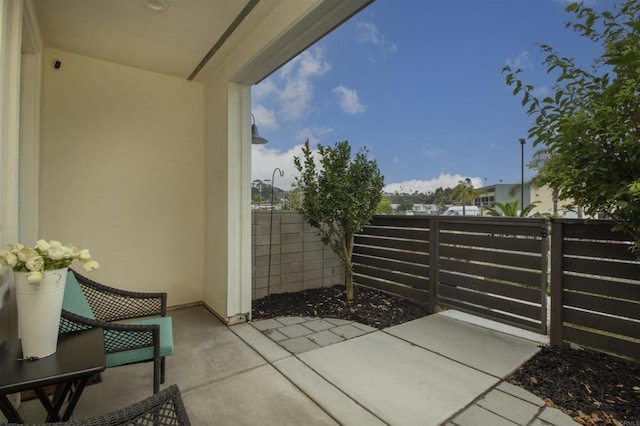 view of patio with fence
