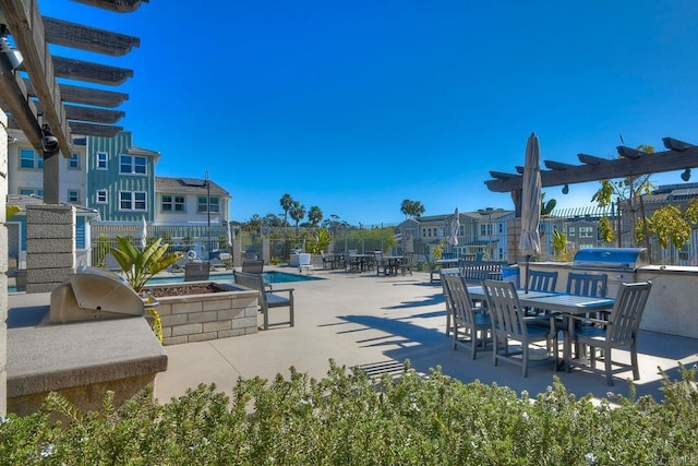 1121 Makena Way, Oceanside, CA 92054 - view of community with exterior kitchen, outdoor dining area, and a patio area