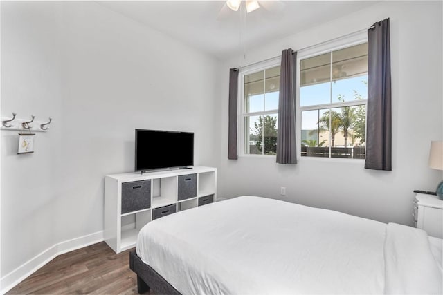 1121 Makena Way, Oceanside, CA 92054 - bedroom with dark wood-style flooring, baseboards, and a ceiling fan