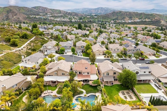 28433 Pinewood Ct, Saugus, CA 91390 - aerial view of residential area with a mountainous background and a pool area