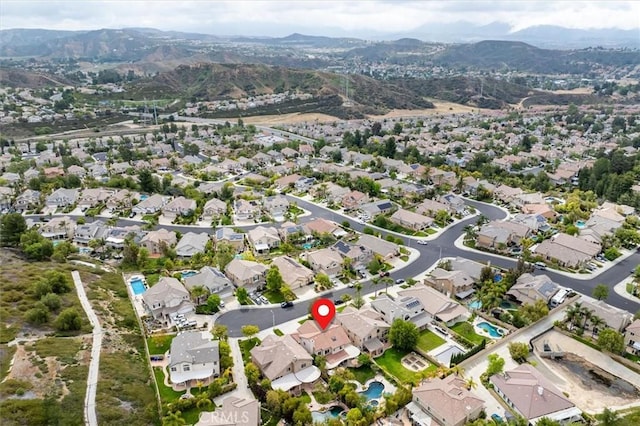 28433 Pinewood Ct, Saugus, CA 91390 - aerial overview of property's location featuring mountains and nearby suburban area