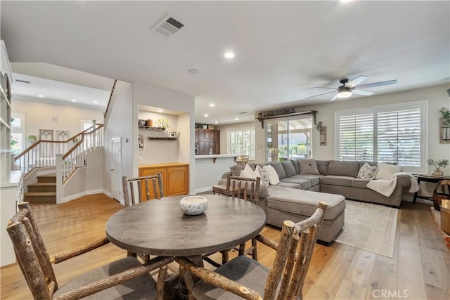 28433 Pinewood Ct, Saugus, CA 91390 - dining area featuring light wood finished floors, a ceiling fan, stairway, and recessed lighting