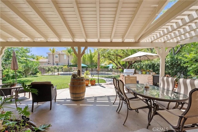 28433 Pinewood Ct, Saugus, CA 91390 - fenced backyard with outdoor dining area, a patio area, exterior kitchen, and a pergola
