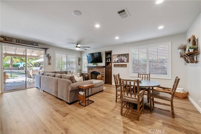 28433 Pinewood Ct, Saugus, CA 91390 - living room with ceiling fan, light wood-type flooring, a fireplace, and recessed lighting