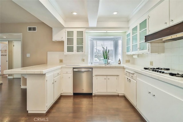 kitchen featuring dishwasher, a peninsula, white gas stovetop, under cabinet range hood, and visible vents