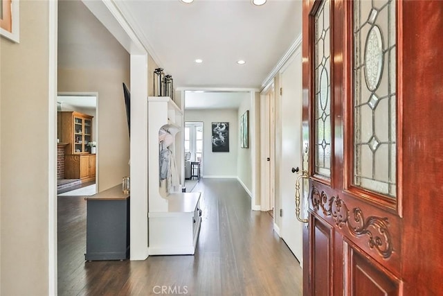 foyer featuring recessed lighting, baseboards, and dark wood-style floors