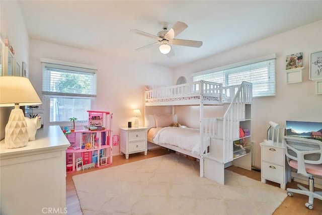 bedroom with wood finished floors