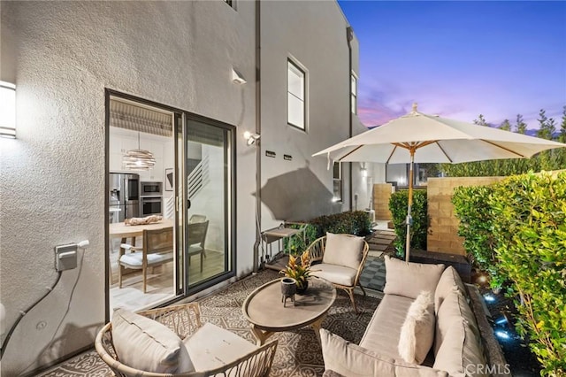 145 Novel, Irvine, CA 92618 - patio terrace at dusk with an outdoor living space