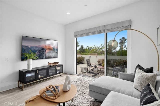 145 Novel, Irvine, CA 92618 - living room featuring recessed lighting and wood finished floors