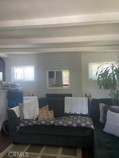 20243 Bassett St, Winnetka, CA 91306 - living area featuring beam ceiling