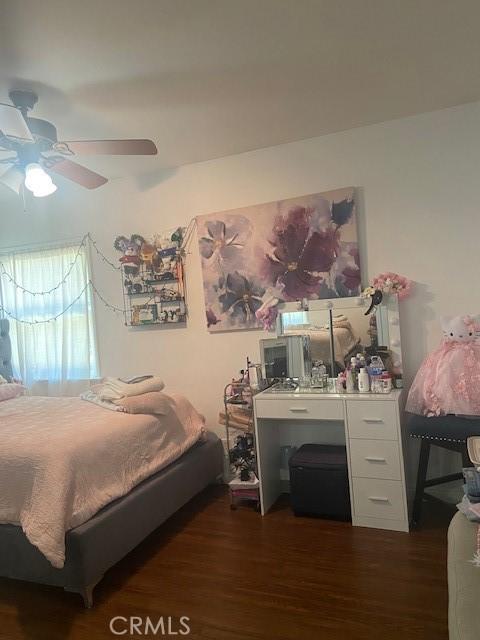 20243 Bassett St, Winnetka, CA 91306 - bedroom with dark wood finished floors and ceiling fan