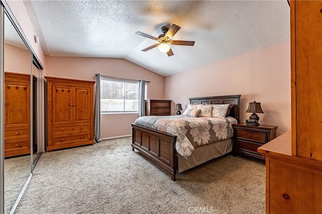 510 Monika Ct, Beaumont, CA 92223 - bedroom with a ceiling fan, vaulted ceiling, a textured ceiling, and light colored carpet