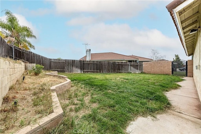 510 Monika Ct, Beaumont, CA 92223 - view of yard with a fenced backyard and a gate