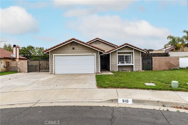 510 Monika Ct, Beaumont, CA 92223 - single story home with a front lawn, a garage, a gate, concrete driveway, and a tiled roof