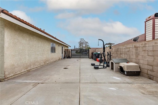 510 Monika Ct, Beaumont, CA 92223 - view of patio / terrace featuring a gate and fence