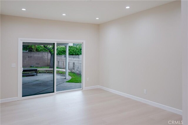 16840 Superior St, Northridge, CA 91343 - spare room featuring light wood-style floors, recessed lighting, and baseboards