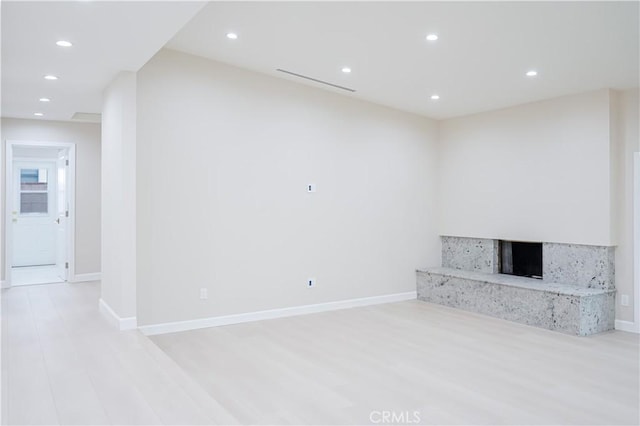 16840 Superior St, Northridge, CA 91343 - unfurnished living room with light wood finished floors, recessed lighting, a premium fireplace, and baseboards
