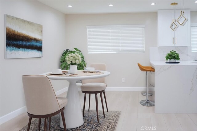 16840 Superior St, Northridge, CA 91343 - dining space with recessed lighting, light wood finished floors, and baseboards